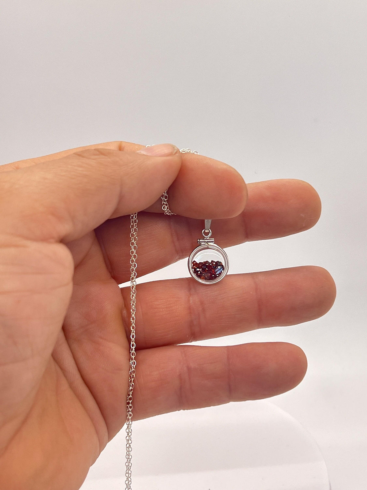 Handmade diminutive sterling silver garnet shaker locket lucite view locket, necklace, beautiful january birthstone. 1.65 tcw, red round cut