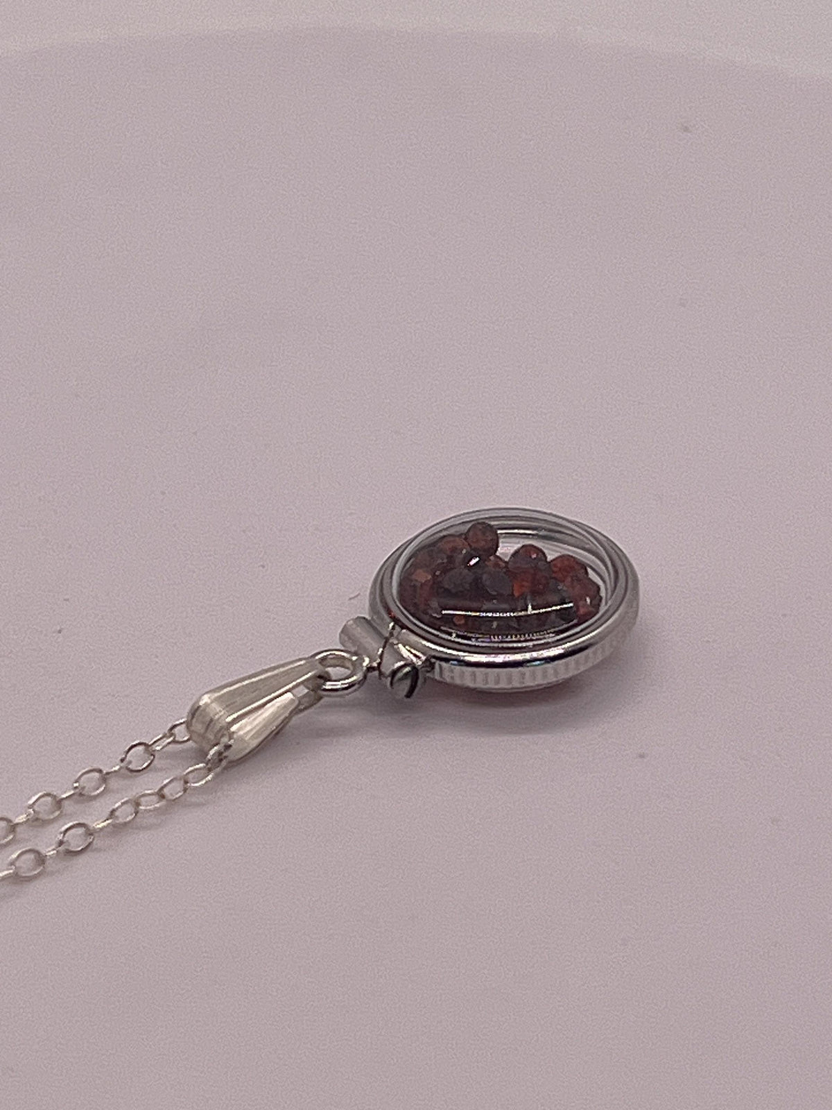 Handmade diminutive sterling silver garnet shaker locket lucite view locket, necklace, beautiful january birthstone. 1.65 tcw, red round cut