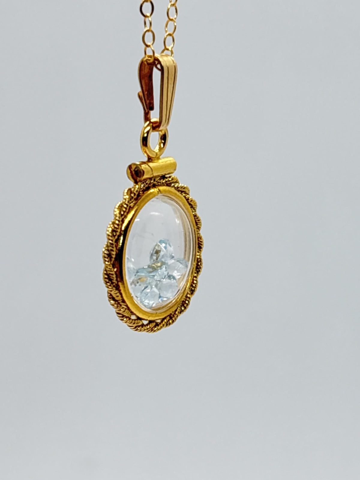 Handmade 12.5 mm 14k gold filled gemstone  shaker locket with twisted rope edge bezel, 0.75 cttw. sky blue topaz,  birthstone december