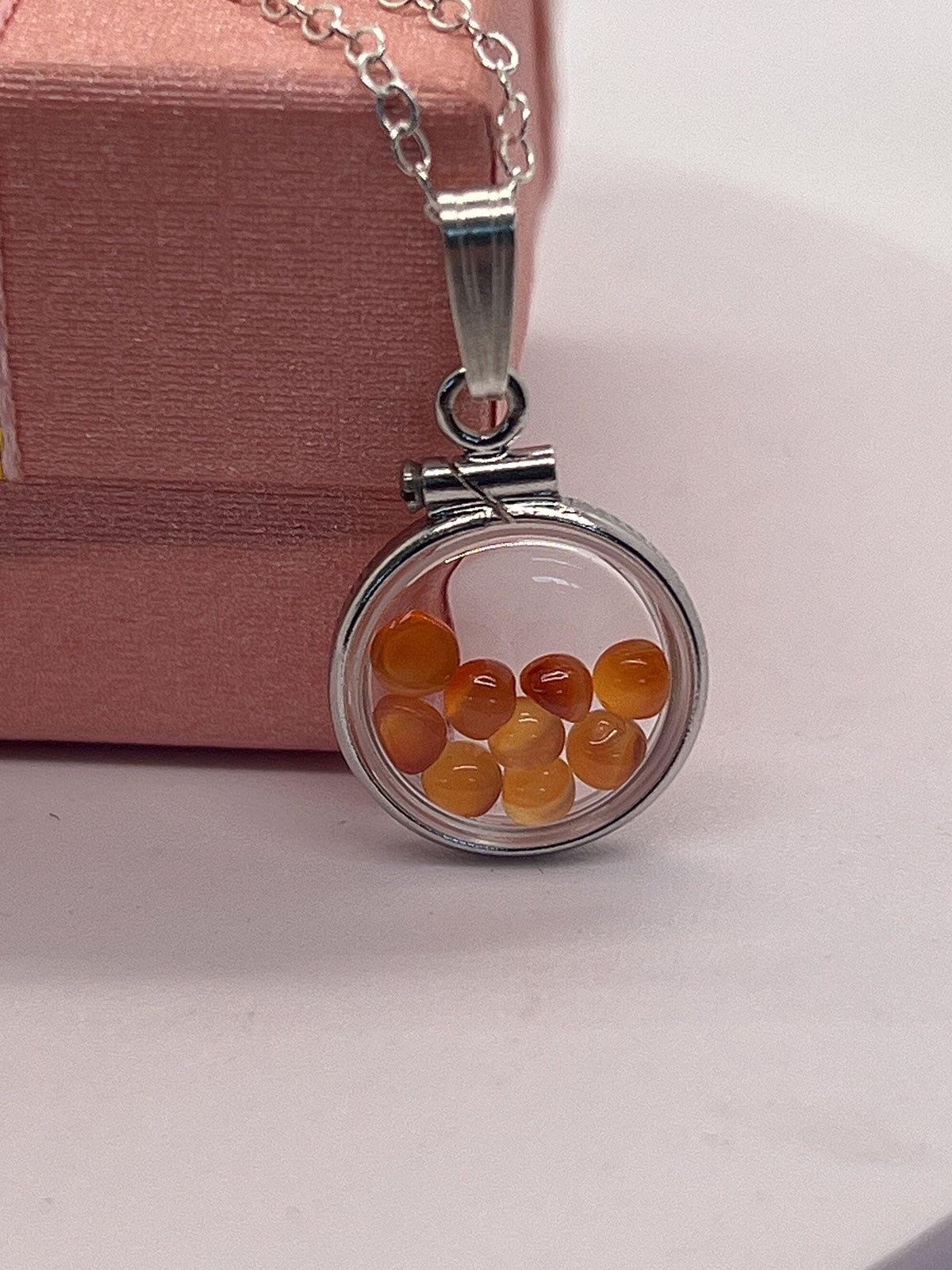 Handmade diminutive sterling silver carnelian shaker locket lucite view locket, necklace, beautiful natural orange cabochons. 1.25 tcw