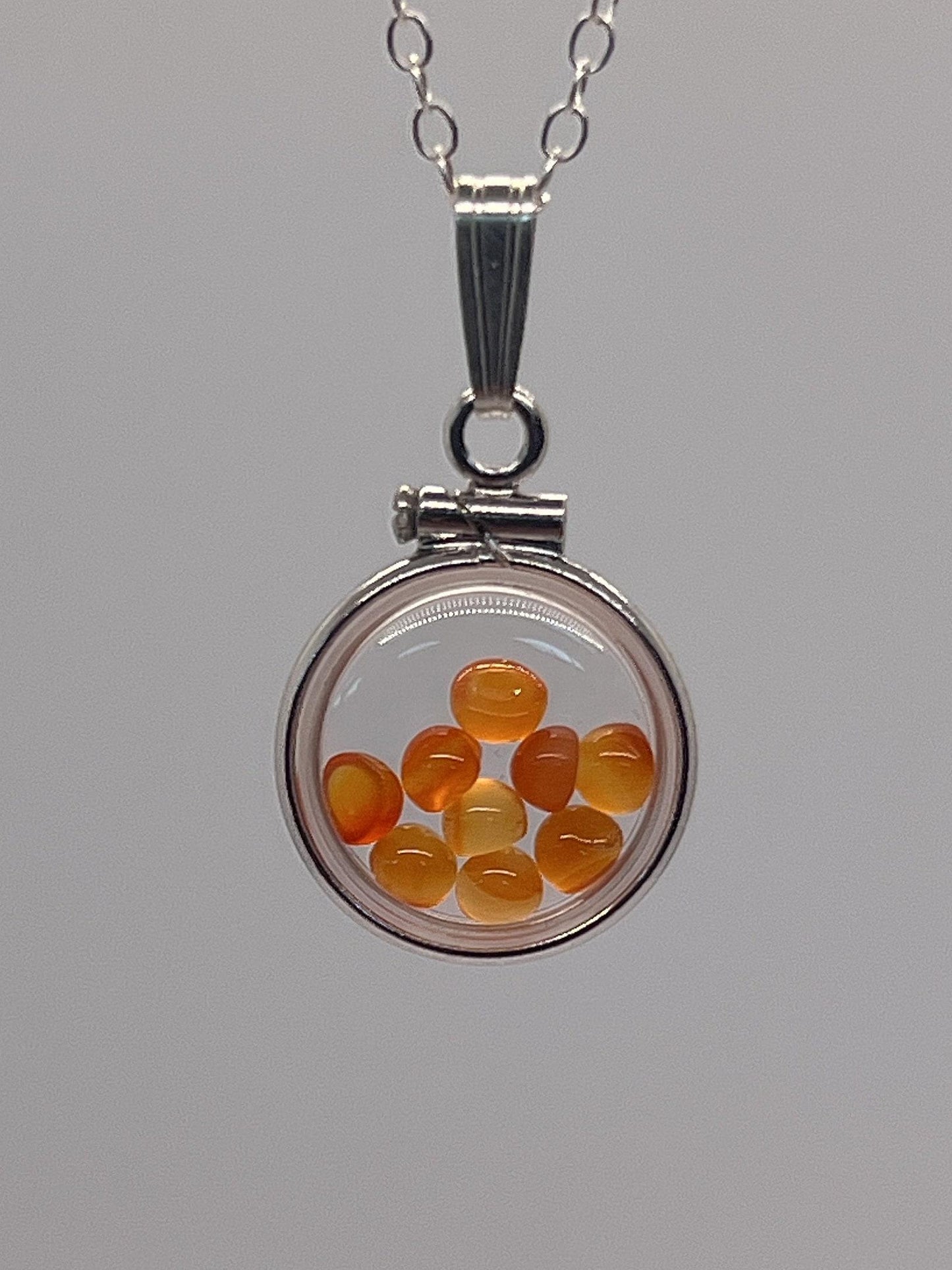 Handmade diminutive sterling silver carnelian shaker locket lucite view locket, necklace, beautiful natural orange cabochons. 1.25 tcw