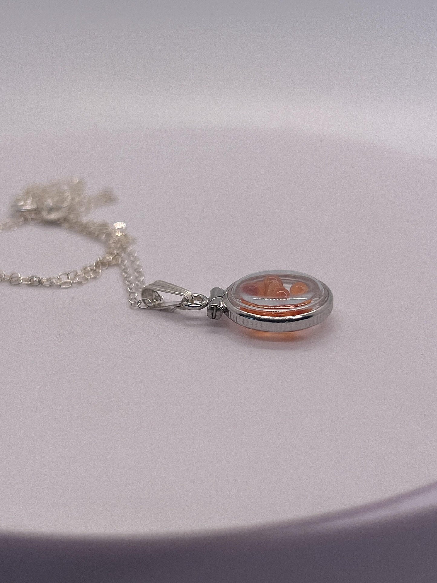 Handmade diminutive sterling silver carnelian shaker locket lucite view locket, necklace, beautiful natural orange cabochons. 1.25 tcw