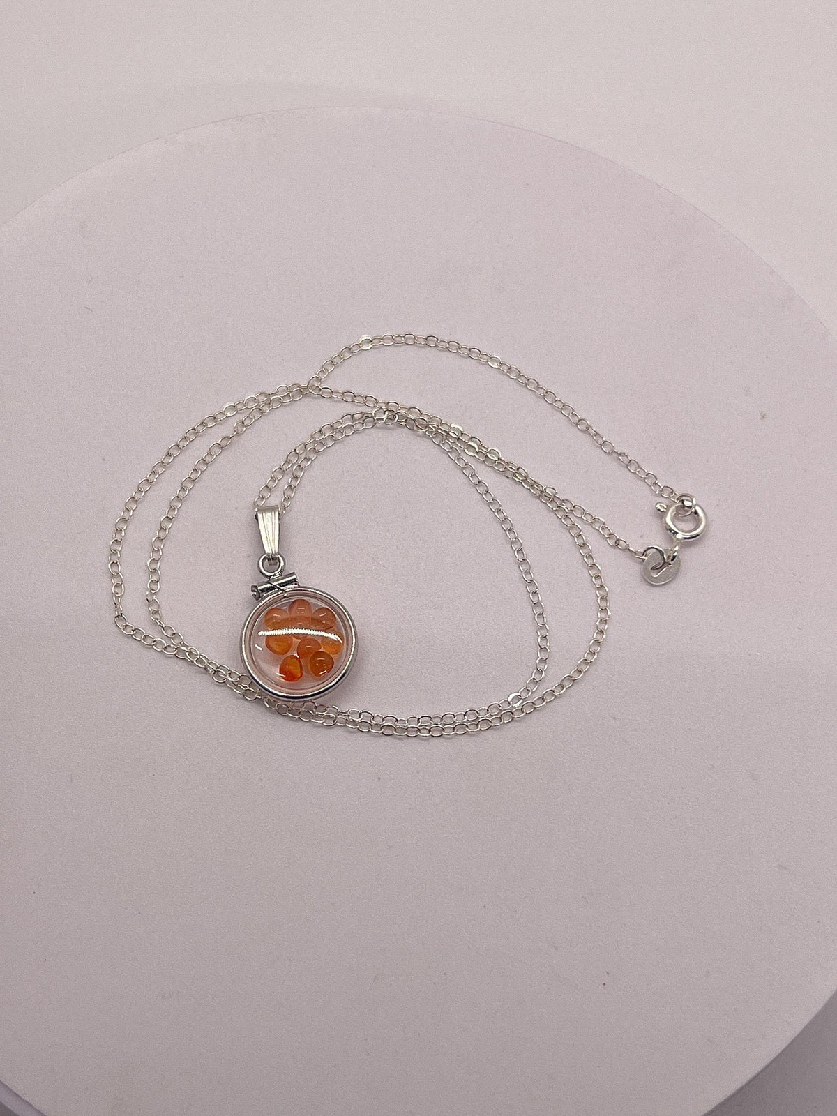 Handmade diminutive sterling silver carnelian shaker locket lucite view locket, necklace, beautiful natural orange cabochons. 1.25 tcw