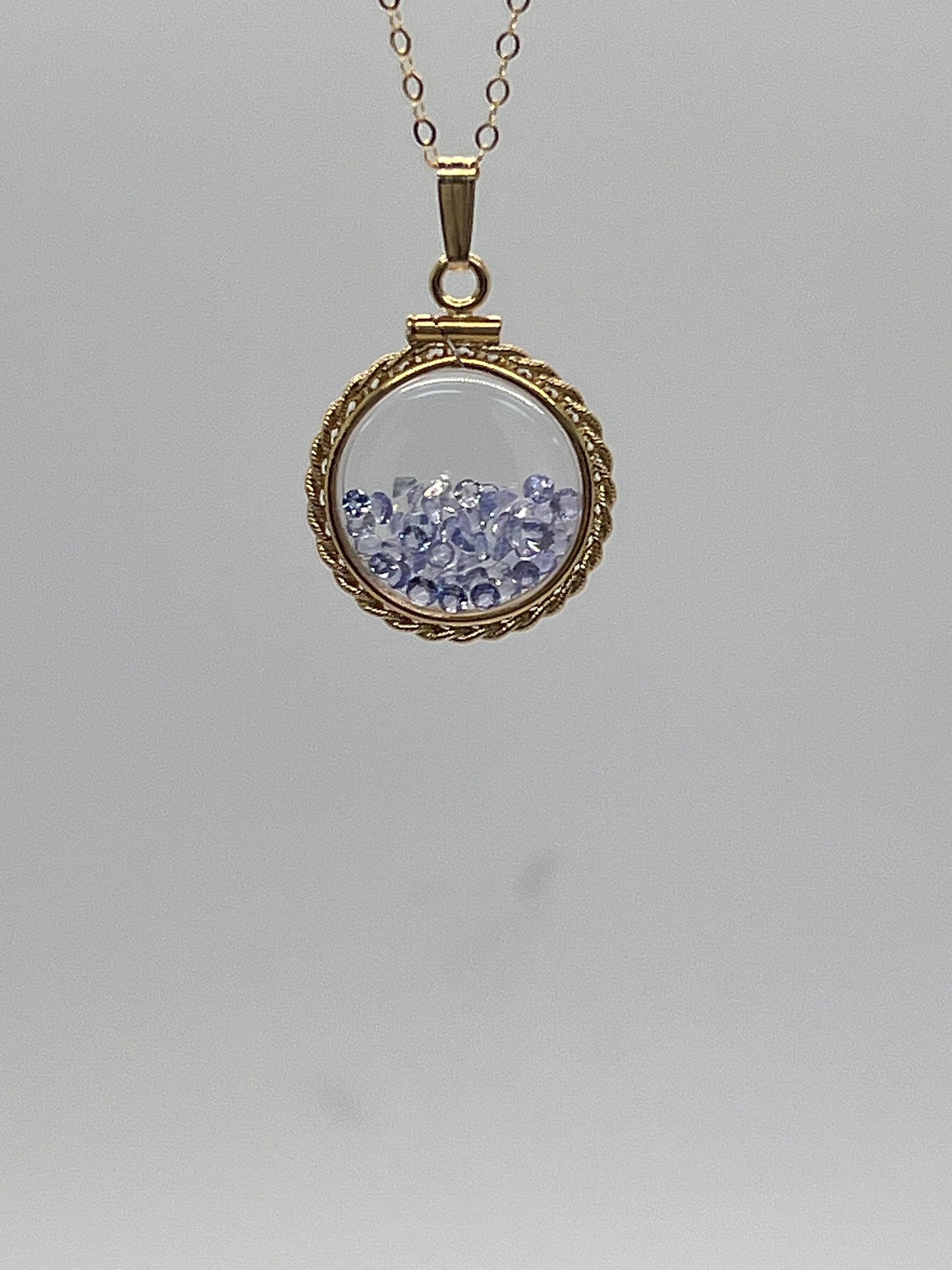 Hand made 21 mm nickel size 14k gold filled lucite tanzanite shaker locket with rope edge december birthstone.