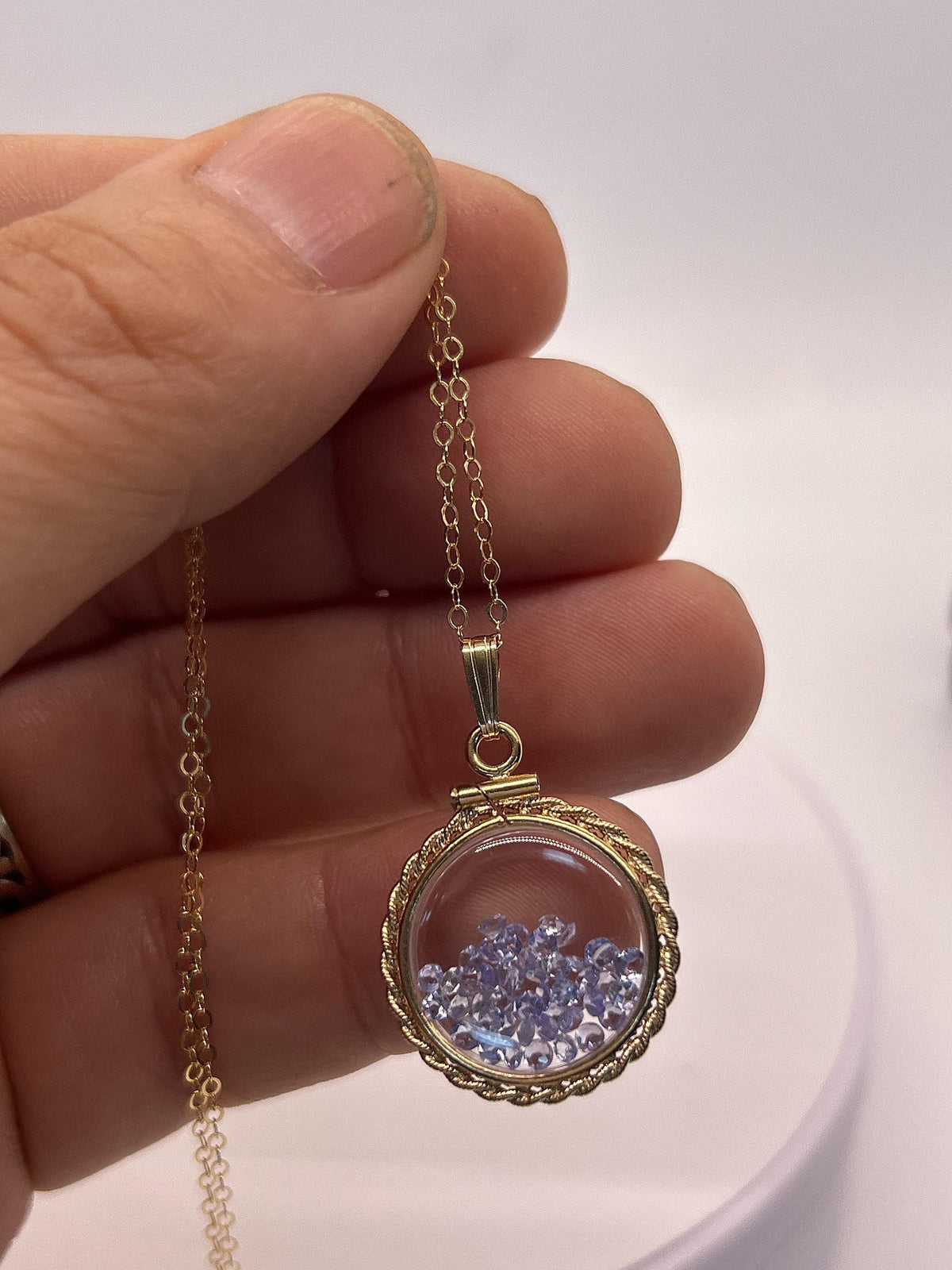 Hand made 21 mm nickel size 14k gold filled lucite tanzanite shaker locket with rope edge december birthstone.