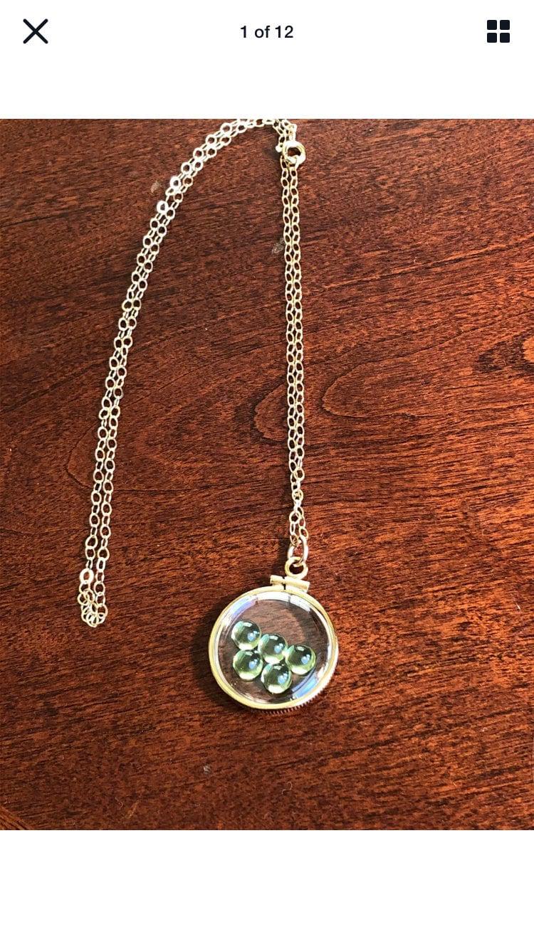 Vintage 12k gold filled locket with five 5mm beautiful green peridot cabochons, 3.26 tcw