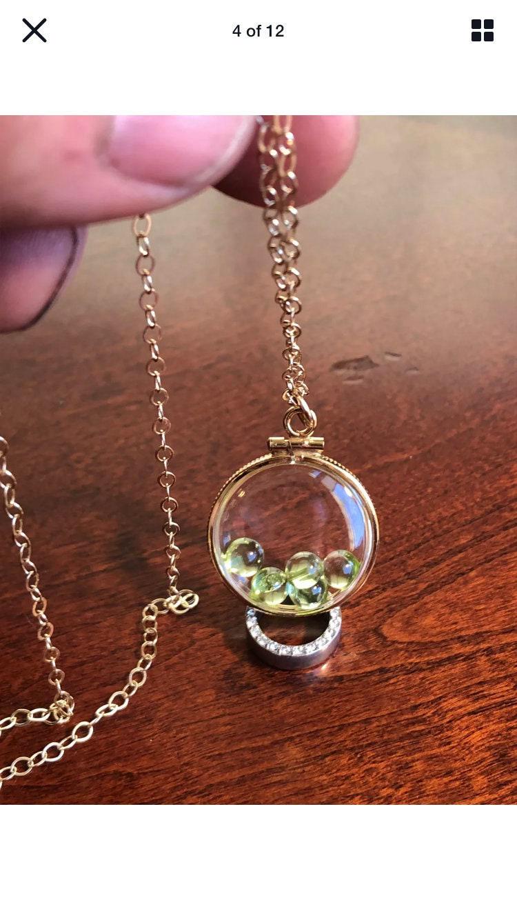 Vintage 12k gold filled locket with five 5mm beautiful green peridot cabochons, 3.26 tcw