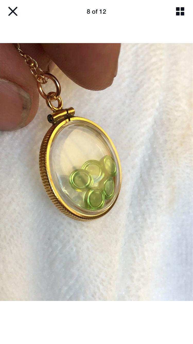 Vintage 12k gold filled locket with five 5mm beautiful green peridot cabochons, 3.26 tcw