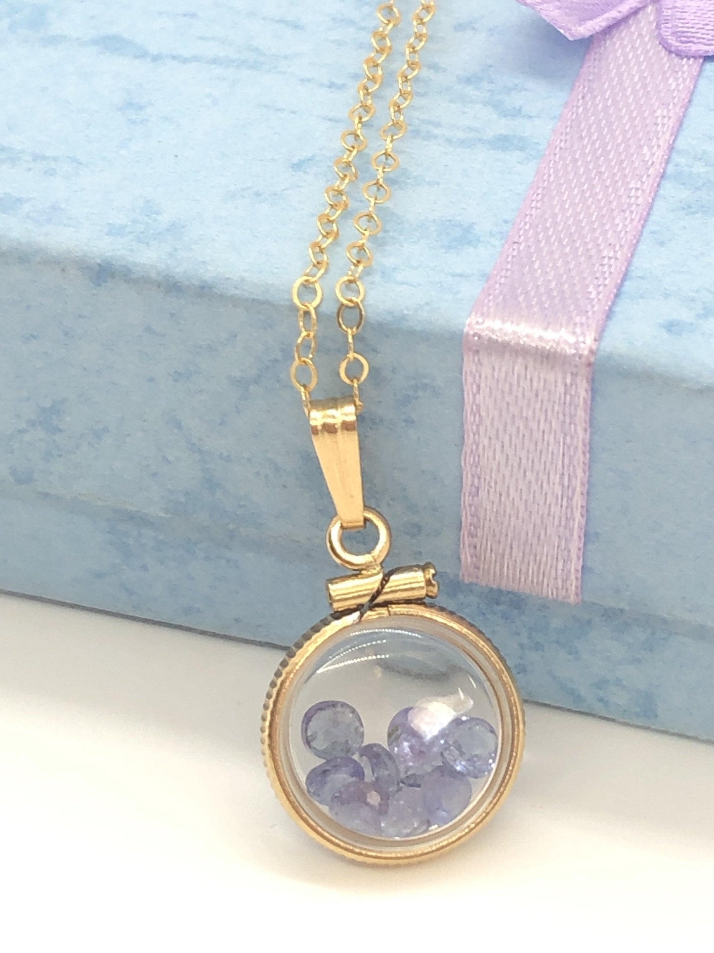 Diminutive  tanzanite shaker locket 14k gf or silver  with beautiful december birthstone, .9tcw round cut gems