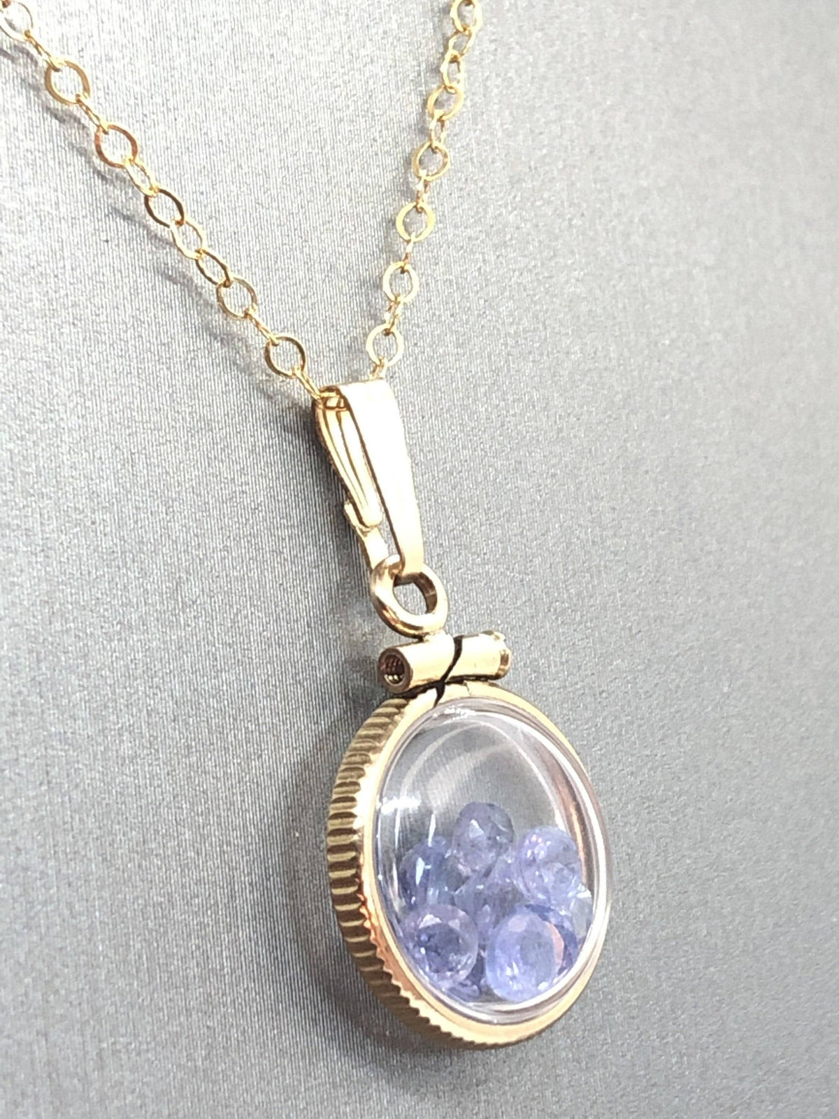 Diminutive  tanzanite shaker locket 14k gf or silver  with beautiful december birthstone, .9tcw round cut gems
