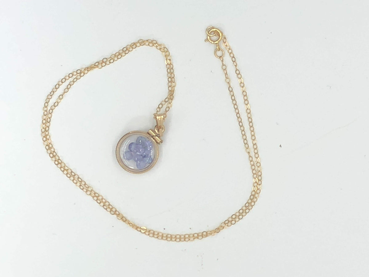 Diminutive  tanzanite shaker locket 14k gf or silver  with beautiful december birthstone, .9tcw round cut gems