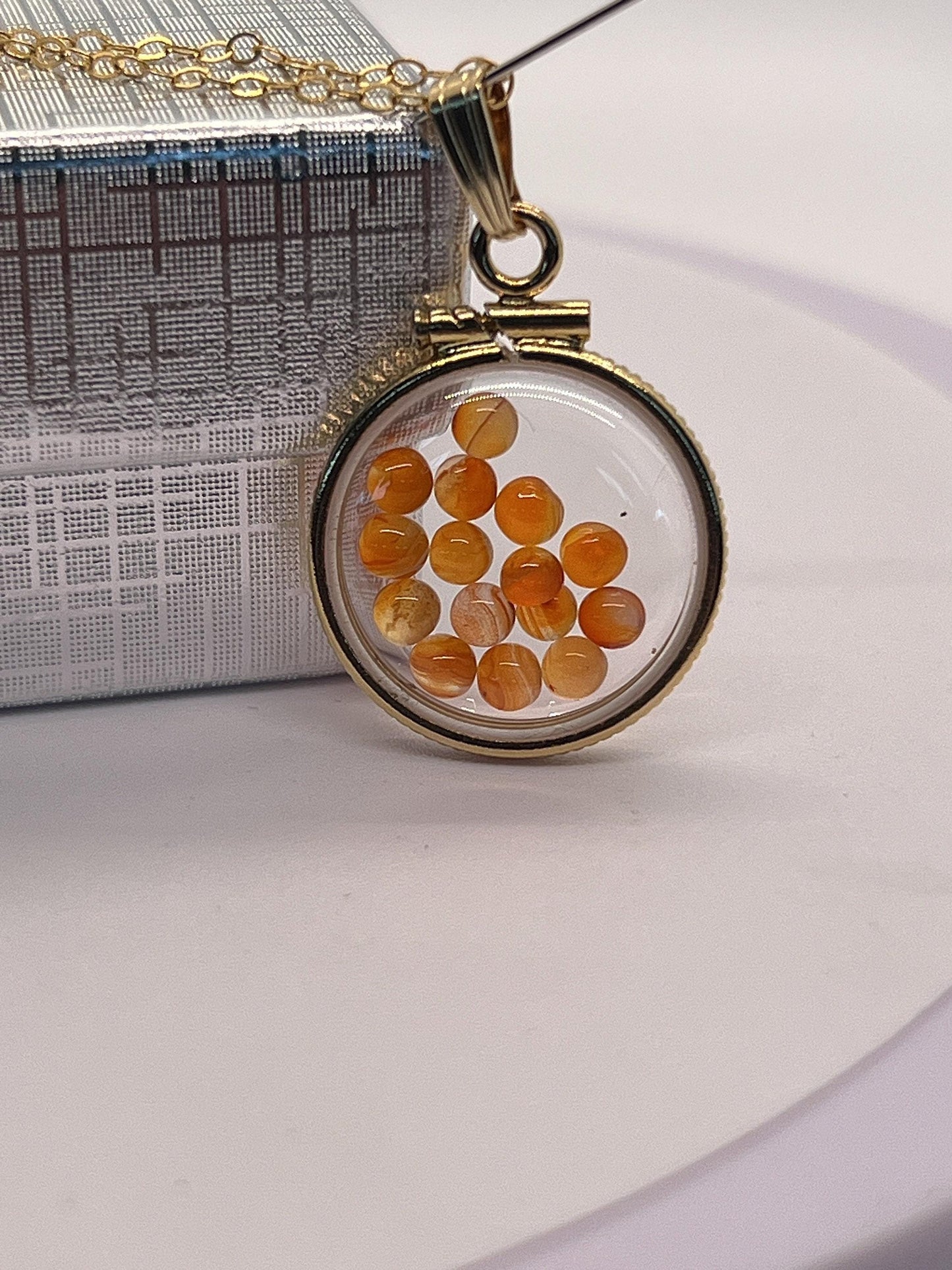 Handmade dime sized carnelian shaker locket,gold filled locket, 2.10 tcw round carnelian cabochons.
