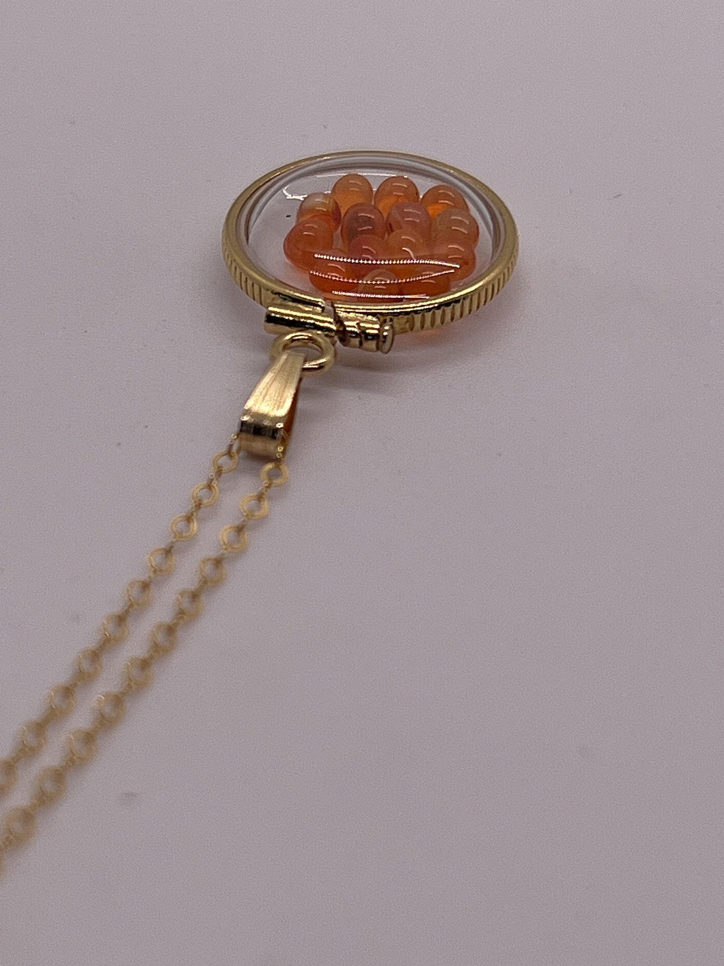 Handmade dime sized carnelian shaker locket,gold filled locket, 2.10 tcw round carnelian cabochons.