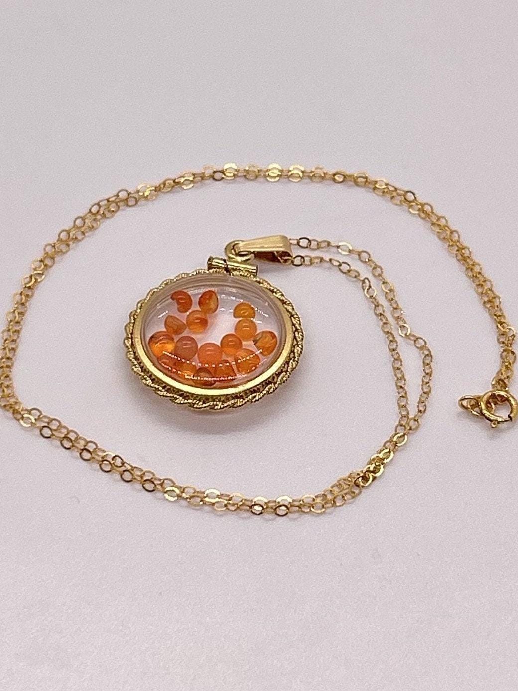 Handmade nickle sized carnelian rope edge gold filled shaker locket, 2.070 ctw round carnelian cabochons.