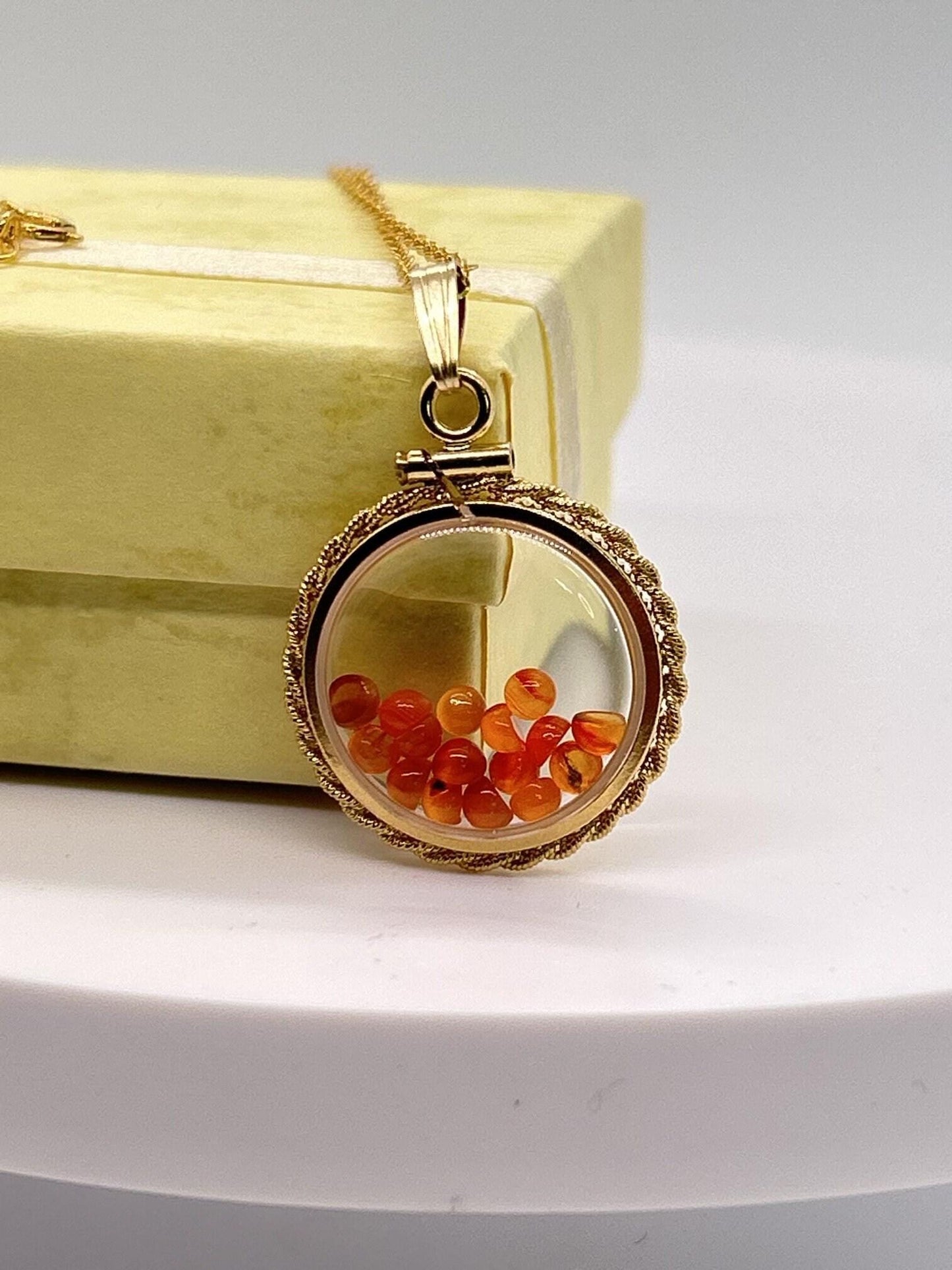 Handmade nickle sized carnelian rope edge gold filled shaker locket, 2.070 ctw round carnelian cabochons.