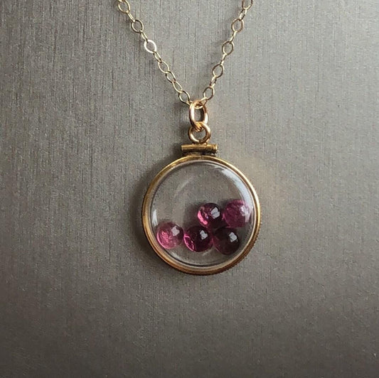 Vintage tourmaline shaker locket  12k gold filled with natural gems. new old stock 50 years old limited supply while last