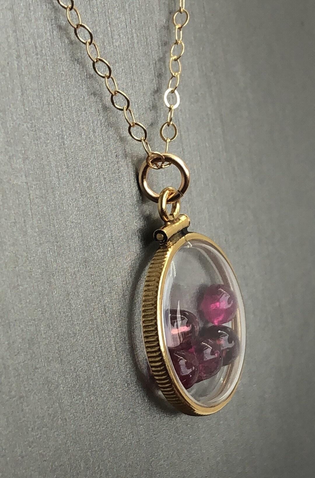 Vintage tourmaline shaker locket  12k gold filled with natural gems. new old stock 50 years old limited supply while last