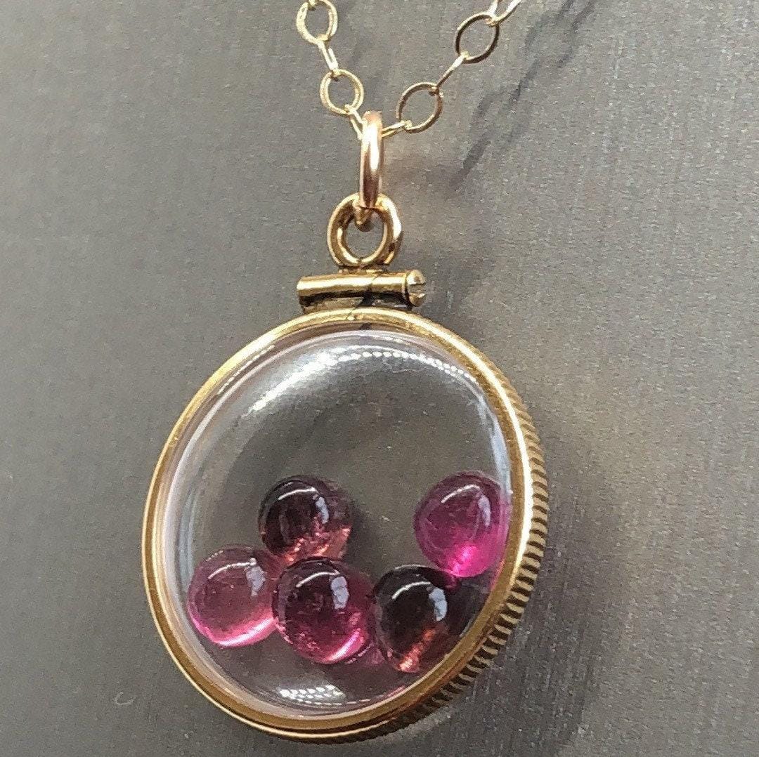 Vintage tourmaline shaker locket  12k gold filled with natural gems. new old stock 50 years old limited supply while last