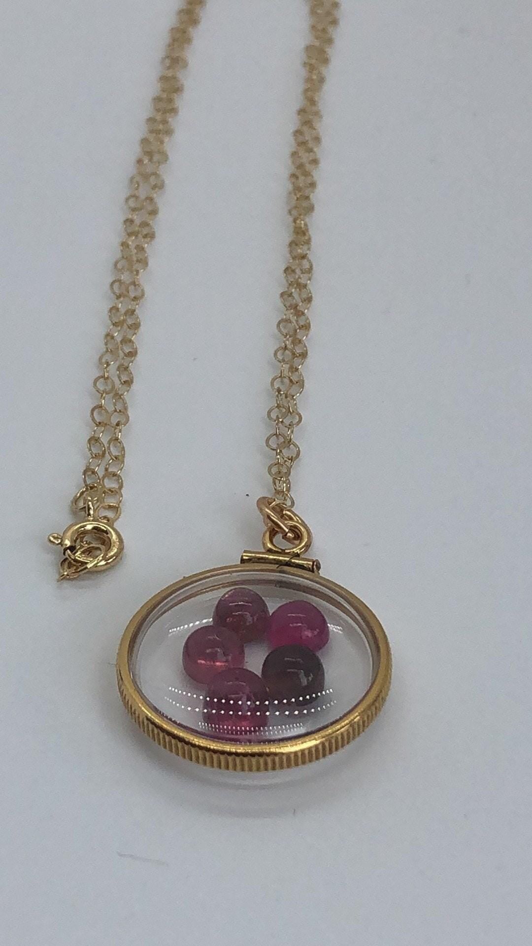 Vintage tourmaline shaker locket  12k gold filled with natural gems. new old stock 50 years old limited supply while last