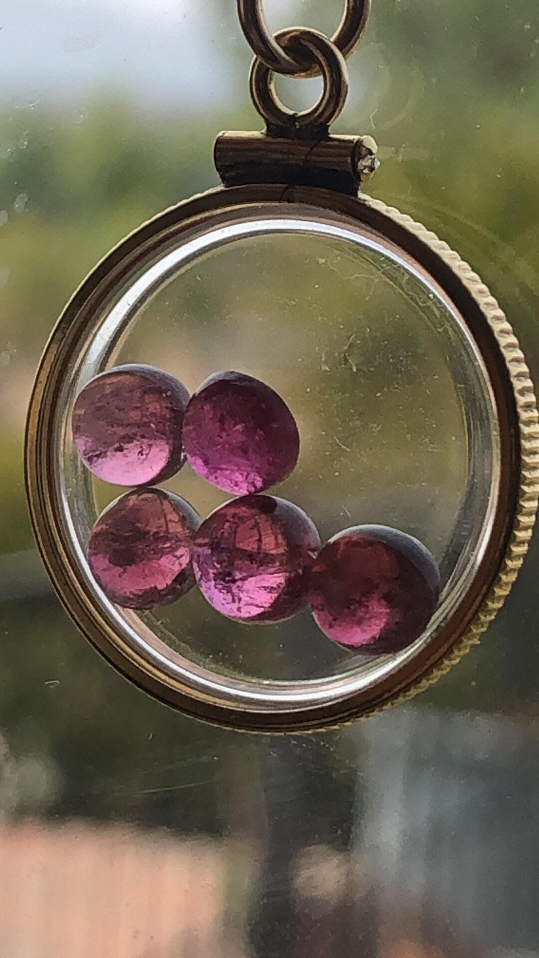 Vintage tourmaline shaker locket  12k gold filled with natural gems. new old stock 50 years old limited supply while last