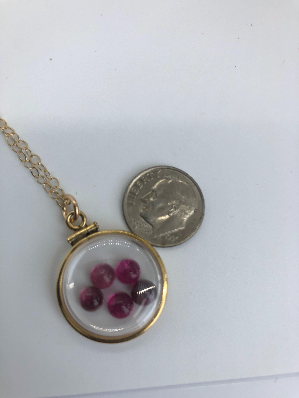 Vintage tourmaline shaker locket  12k gold filled with natural gems. new old stock 50 years old limited supply while last