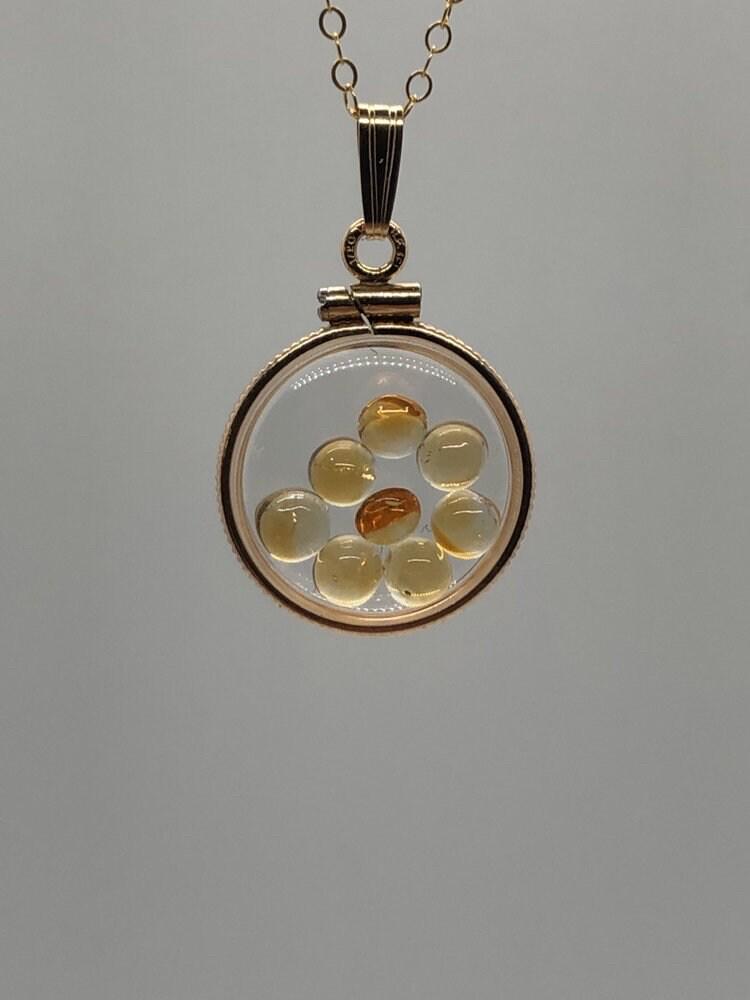 Handmade dime size citrine shaker locket 14k gold filled with beautiful november birthstone. you can custom create a locket, just ask!