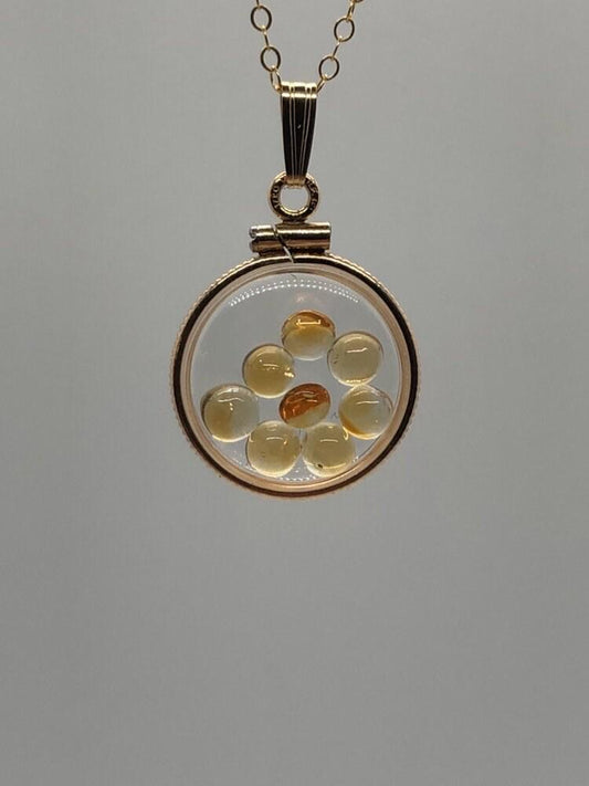 Handmade dime size citrine shaker locket 14k gold filled with beautiful november birthstone. you can custom create a locket, just ask!