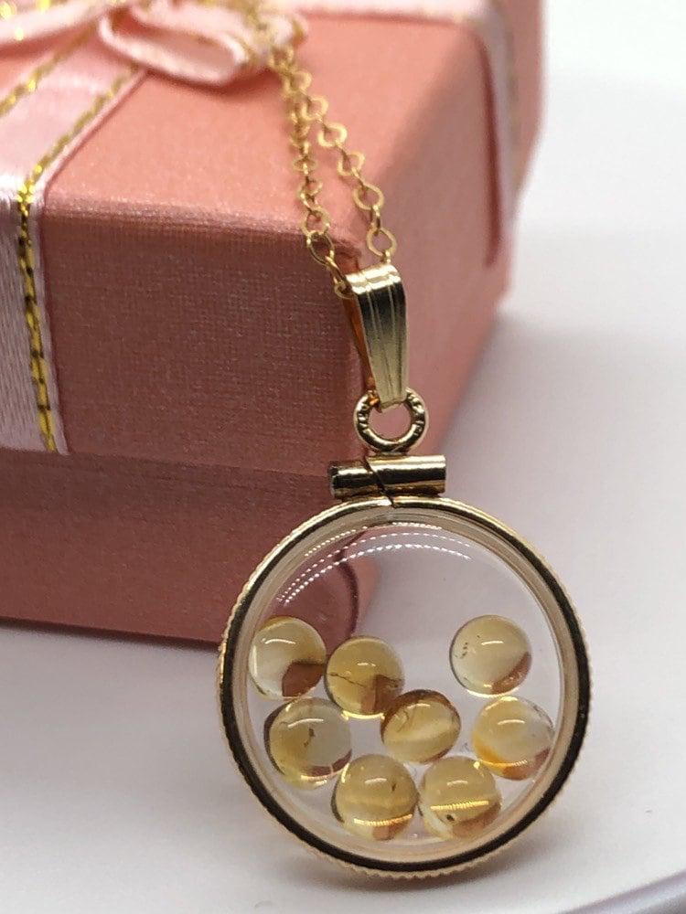 Handmade dime size citrine shaker locket 14k gold filled with beautiful november birthstone. you can custom create a locket, just ask!