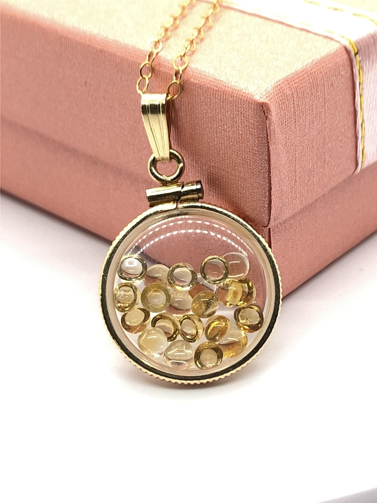 Handmade dime size citrine shaker locket 14k gold filled with beautiful november birthstone. you can custom create a locket, just ask!