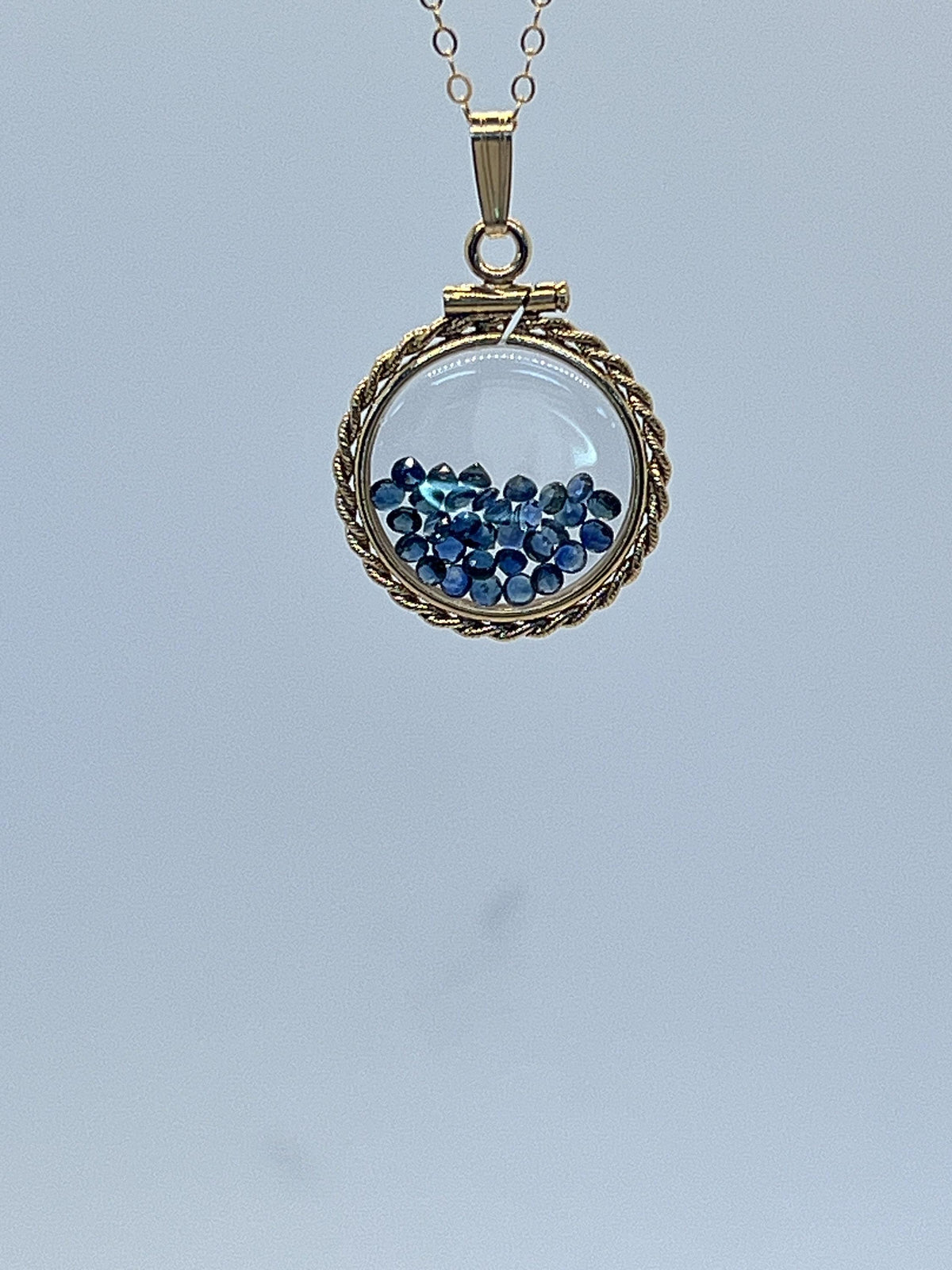 Hand made 21 mm nickel size 14k gold filled lucite sapphire shaker locket with rope edge, september birthstone.