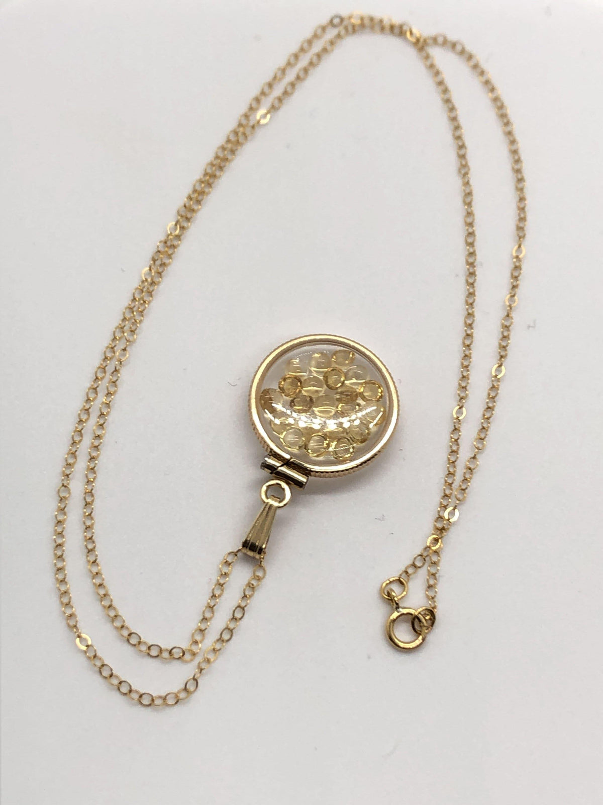 Handmade dime size citrine shaker locket 14k gold filled with beautiful november birthstone. you can custom create a locket, just ask!