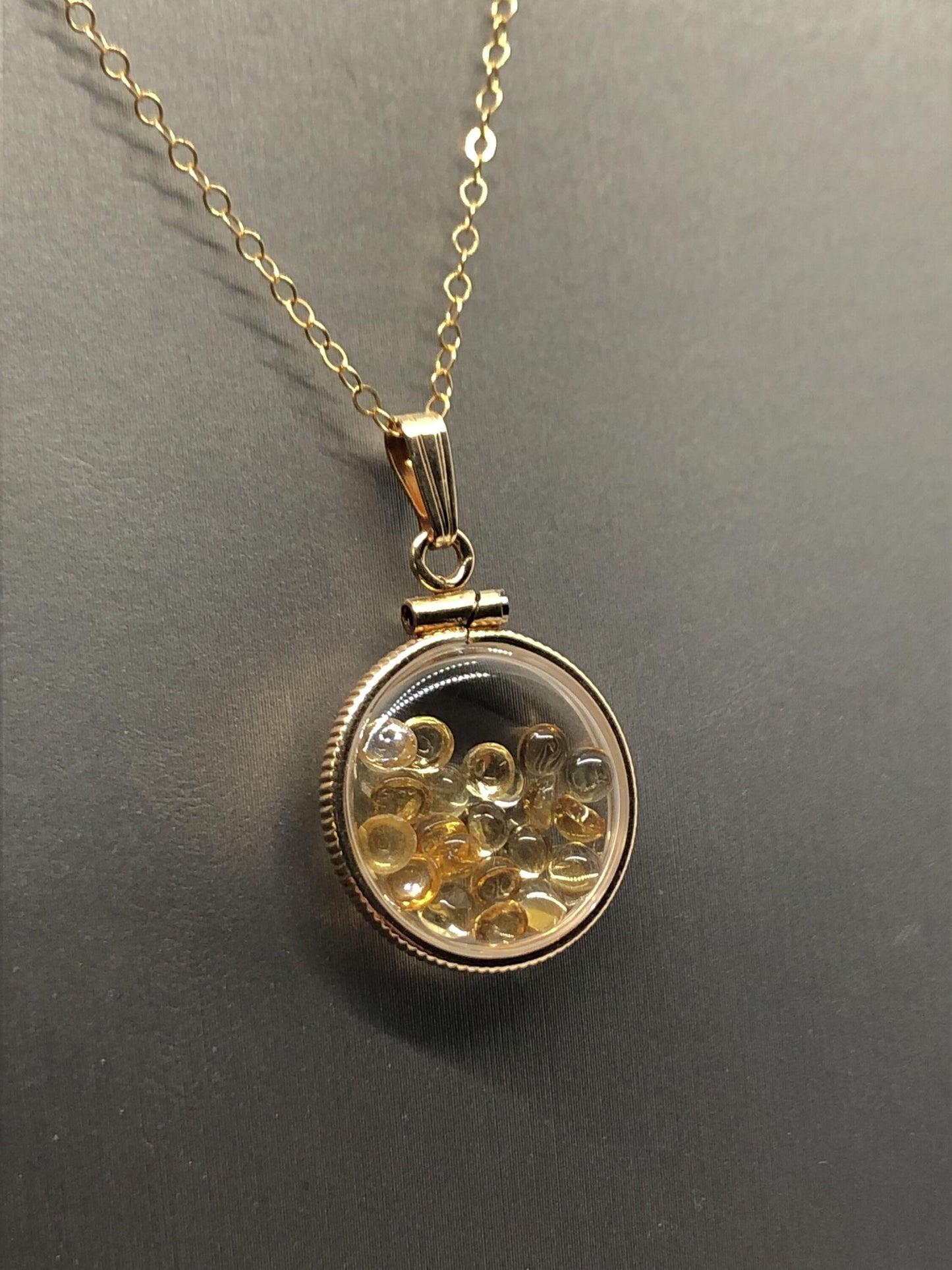 Handmade dime size citrine shaker locket 14k gold filled with beautiful november birthstone. you can custom create a locket, just ask!