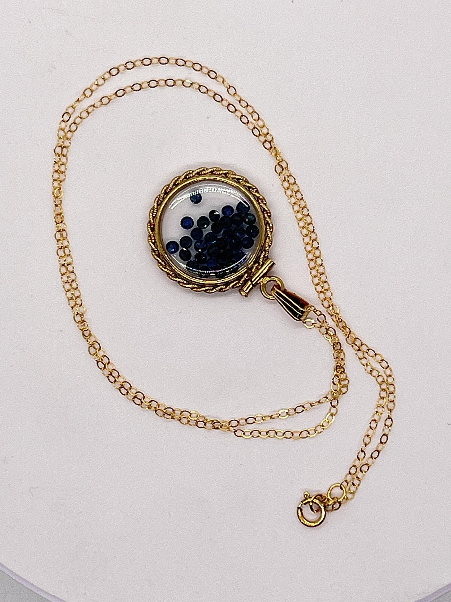 Hand made 21 mm nickel size 14k gold filled lucite sapphire shaker locket with rope edge, september birthstone.