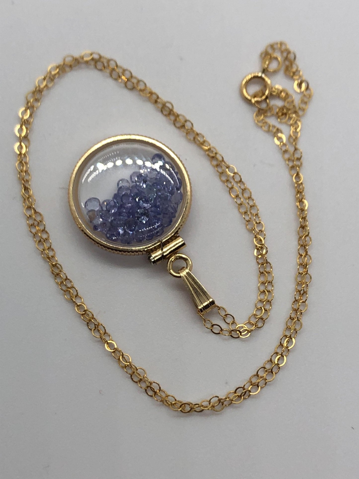 Handmade dime size tanzanite shaker locket 14k gf with beautiful december birthstone, you can custom create a locket ask me!