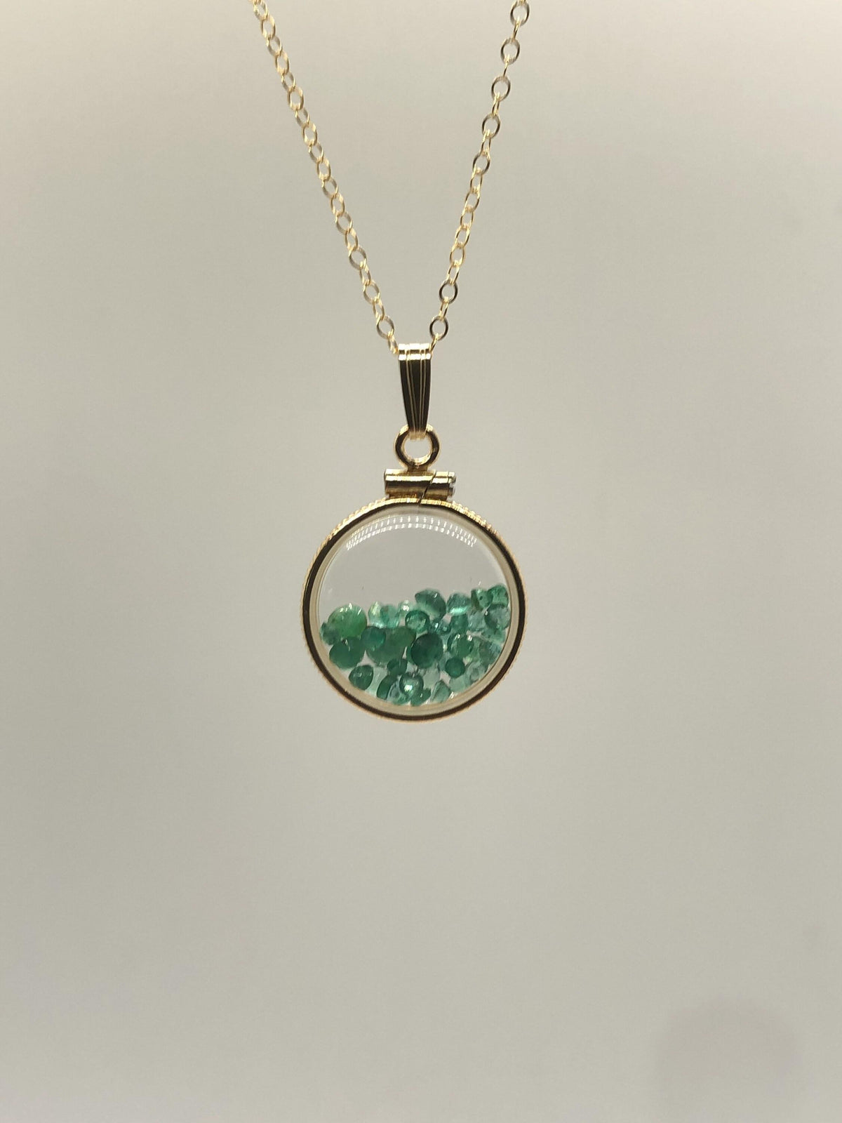 Handmade dime-size emerald shaker locket 14k gold-filled lucite view locket, necklace, beautiful may birthstone.