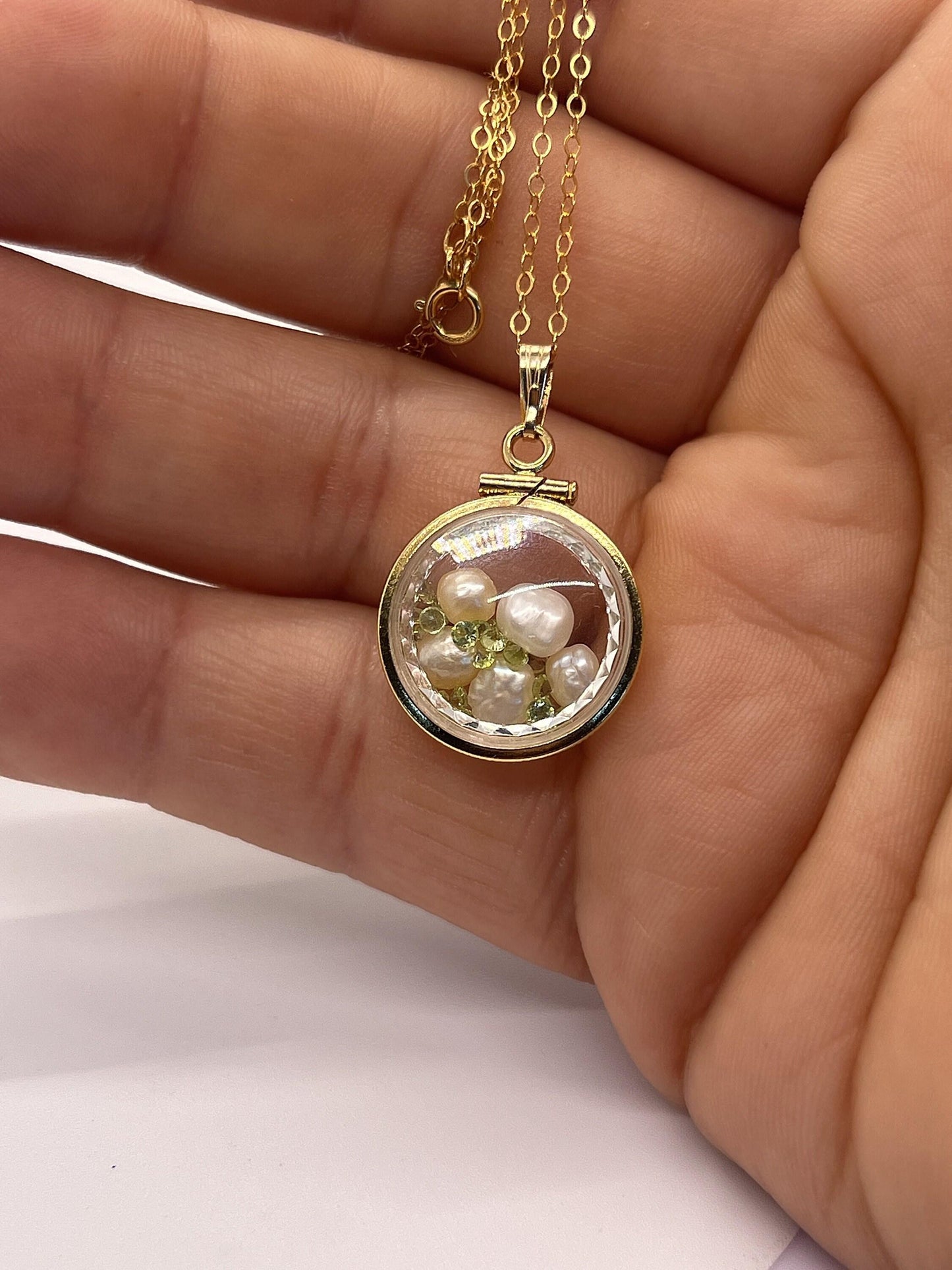 Reversible lucite diamond edge handmade 14k gold filled pearl and peridot shaker  locket nickel size. audrey design.