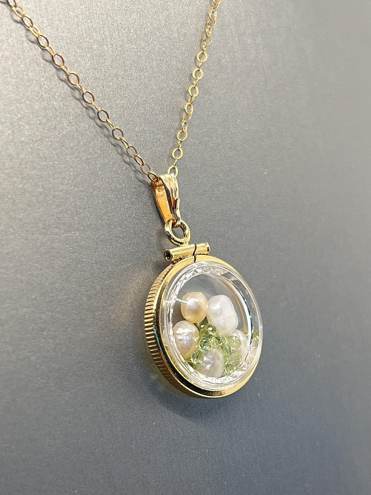 Reversible lucite diamond edge handmade 14k gold filled pearl and peridot shaker  locket nickel size. audrey design.