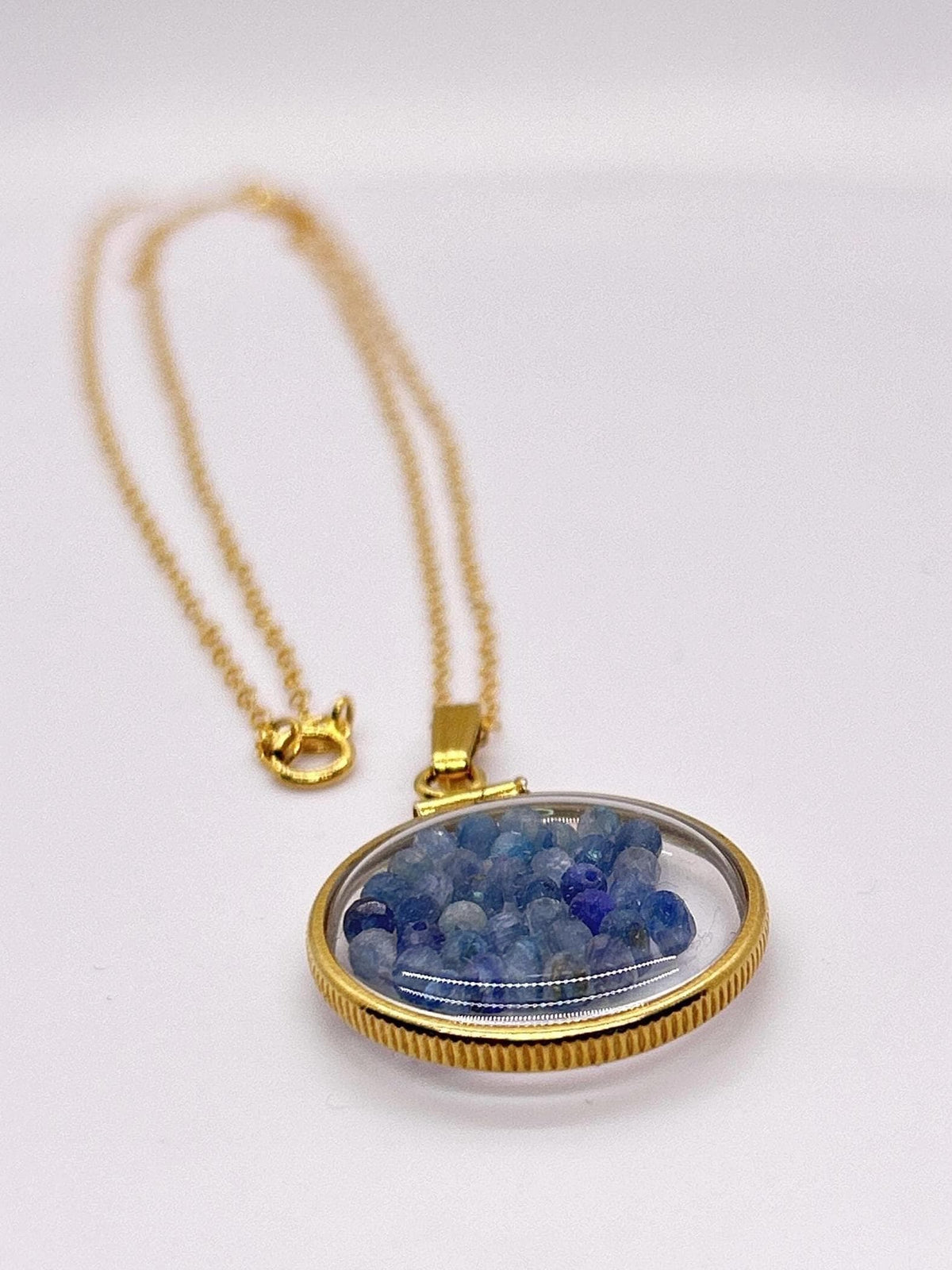 Solid 14k gold lucite 22mm kyanite bead shaker locket with microfaceted 2.5mm beautiful beads. natural gem beads.