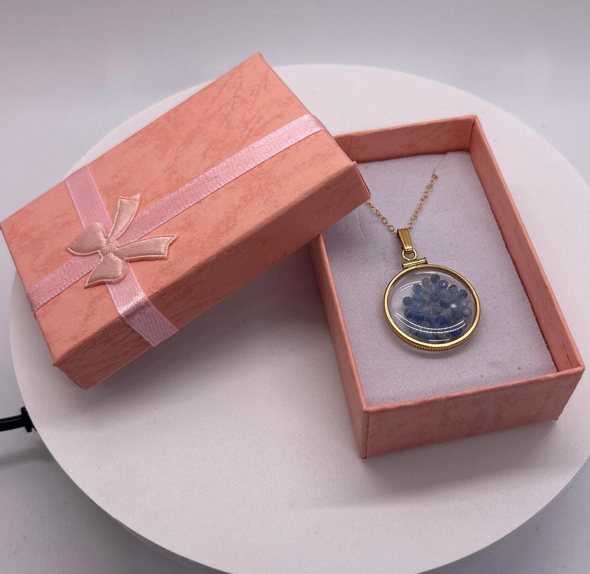 Solid 14k gold lucite 22mm kyanite bead shaker locket with microfaceted 2.5mm beautiful beads. natural gem beads.