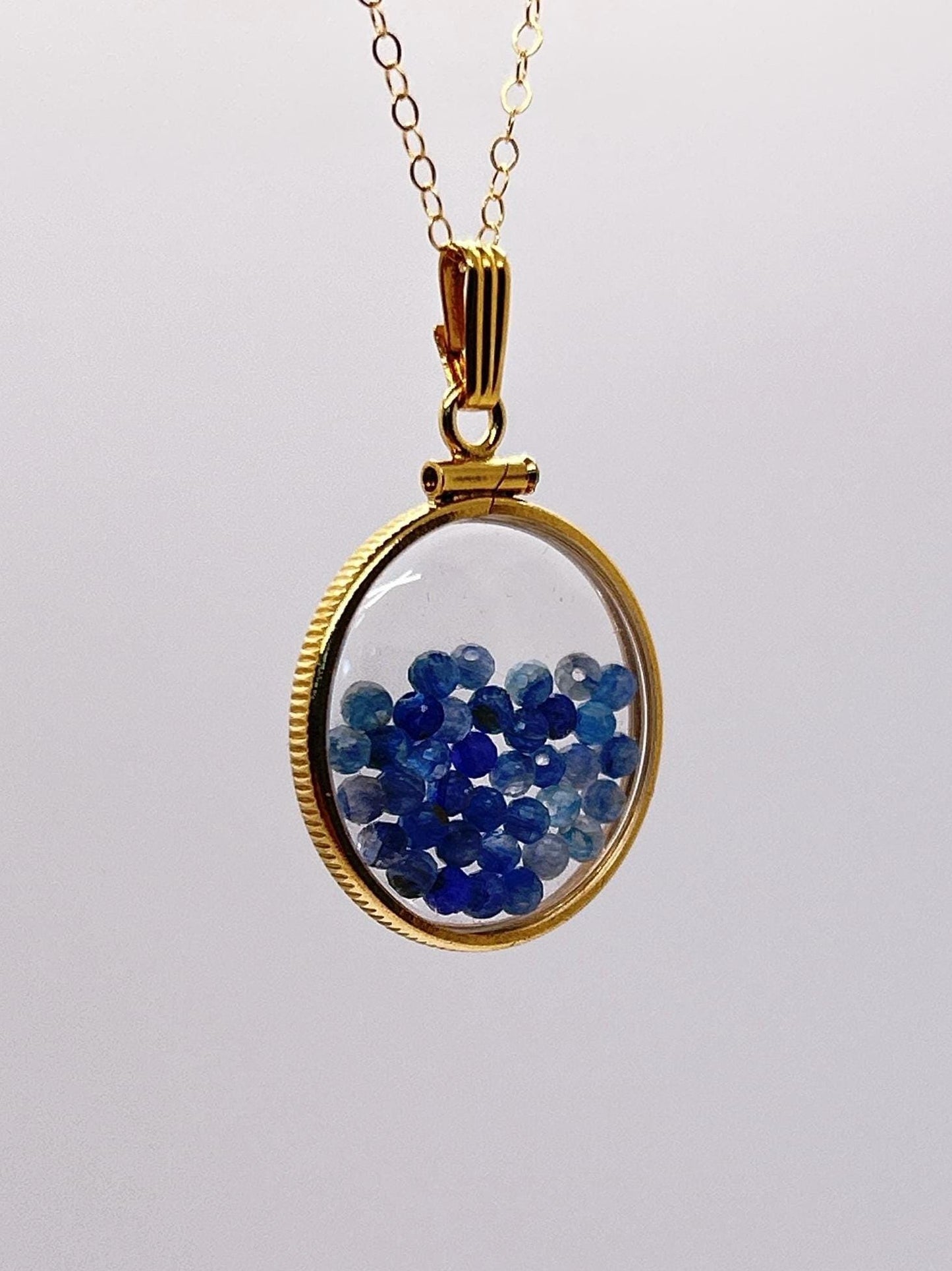 Solid 14k Gold Lucite 22mm Kyanite Bead Shaker Locket with Microfaceted 2.5mm Beautiful Beads. Natural gem beads.