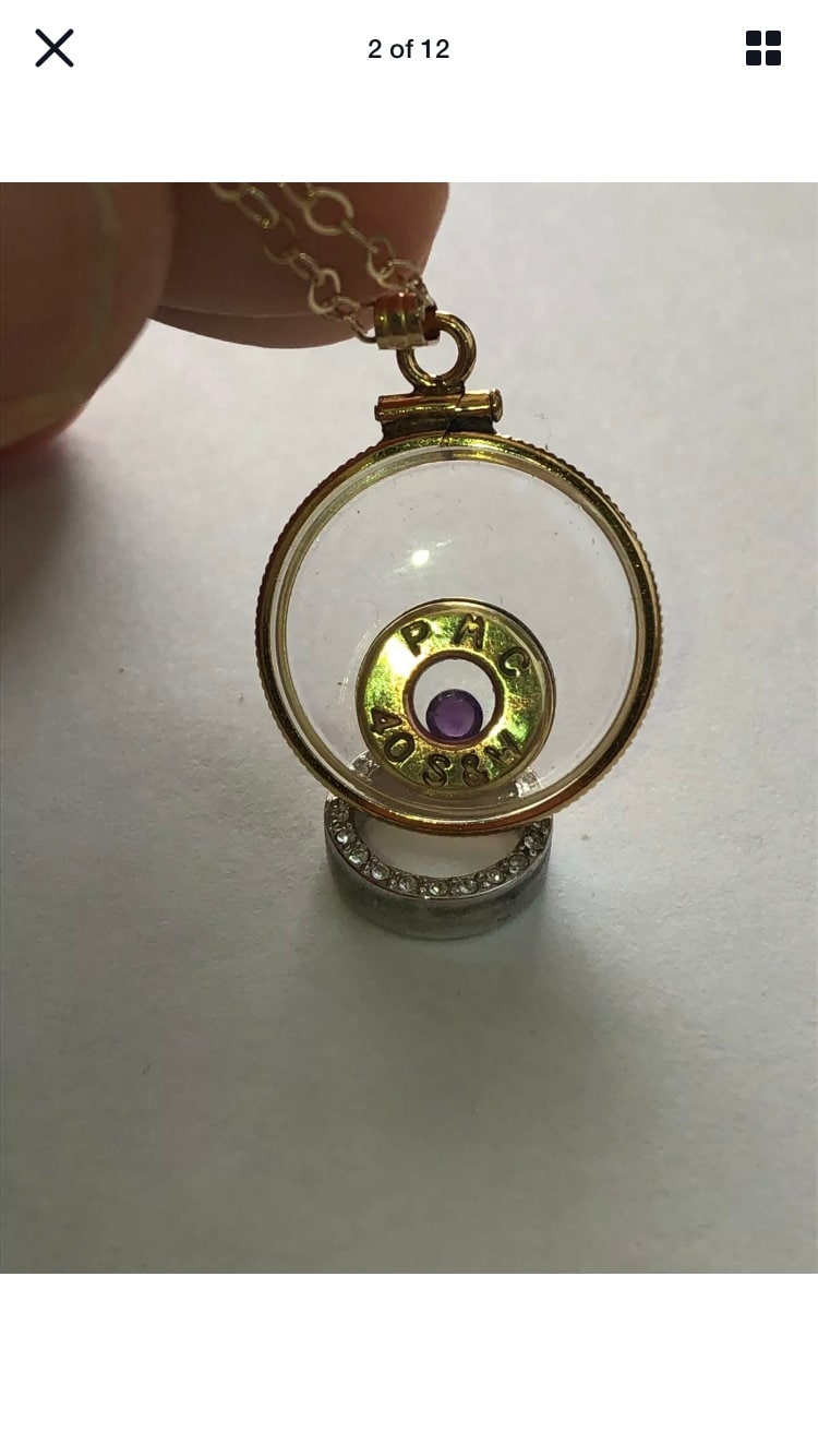 40 cal bullet necklace with floating amethyst Vintage 12k gold filled locket